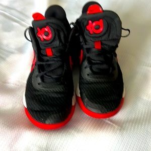 Kyrie tennis shoes 8/ 1/2 mens.  Good condition red and black.   Basketball
